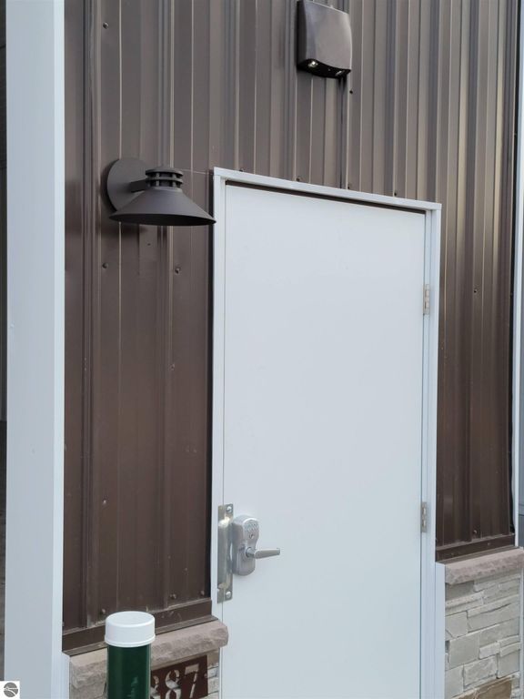 Image 16 of property listing at 3055 Man Cave Lane # 27, Traverse City, MI 49685