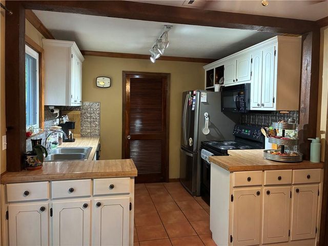 303 13th St N Street, Greenwood, MO 64034