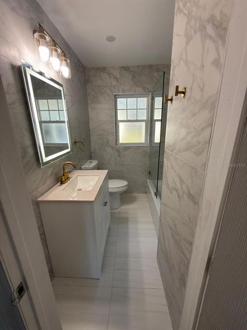 810 W 113TH AVENUE, Tampa, FL 33612