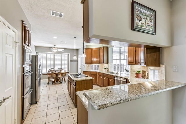 5002 Natural Bridge Drive, Kingwood, TX 77345