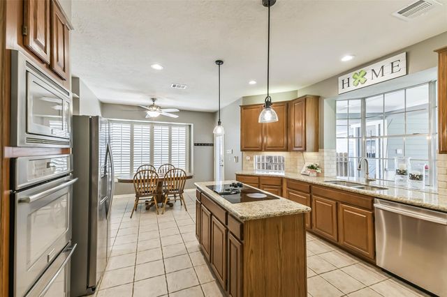 5002 Natural Bridge Drive, Kingwood, TX 77345