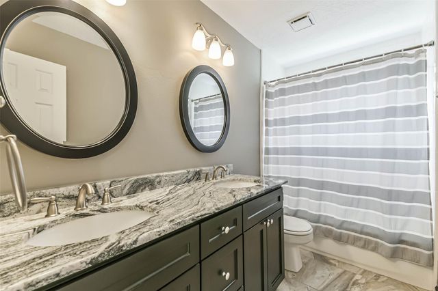 5002 Natural Bridge Drive, Kingwood, TX 77345