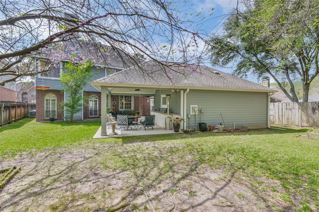 5002 Natural Bridge Drive, Kingwood, TX 77345