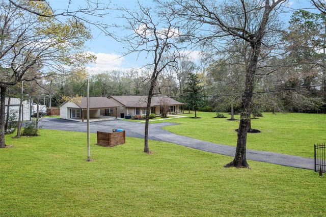 9910 Caddo Trail, Magnolia, TX 77354