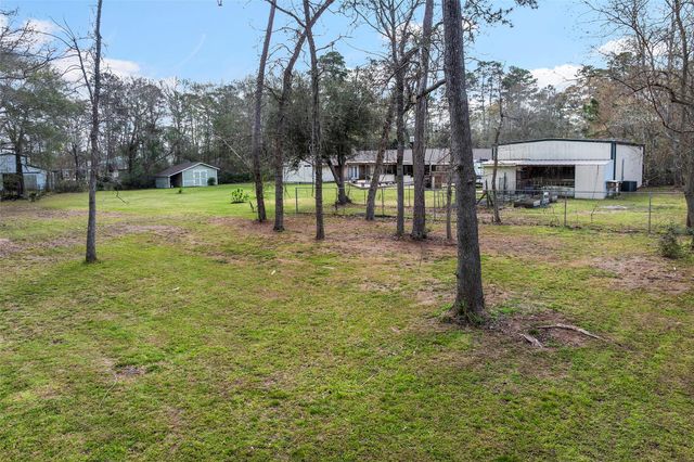 9910 Caddo Trail, Magnolia, TX 77354