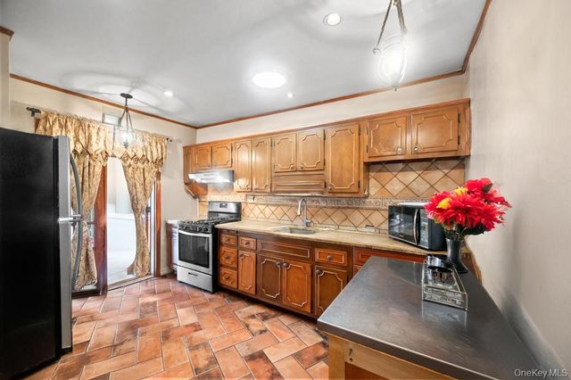 11544 225th Street, Cambria Heights, NY 11411
