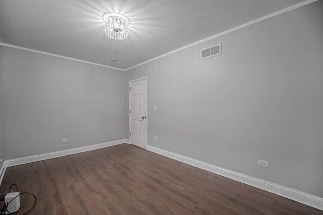 7715 S Oglesby Avenue, Chicago, IL 60649