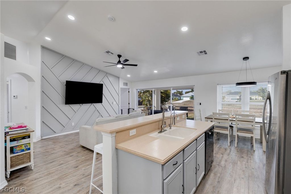 Image 3 of property listing at 1707 SW 3rd ST, Cape Coral, FL 33991