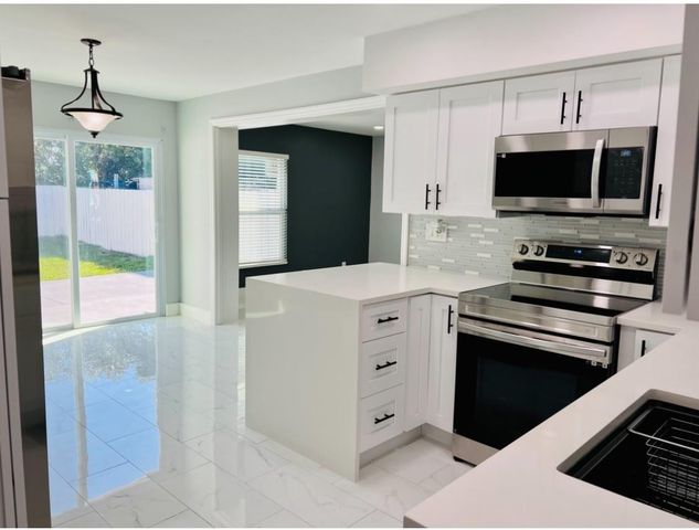 314 Sunshine Drive, Coconut Creek, FL 33066