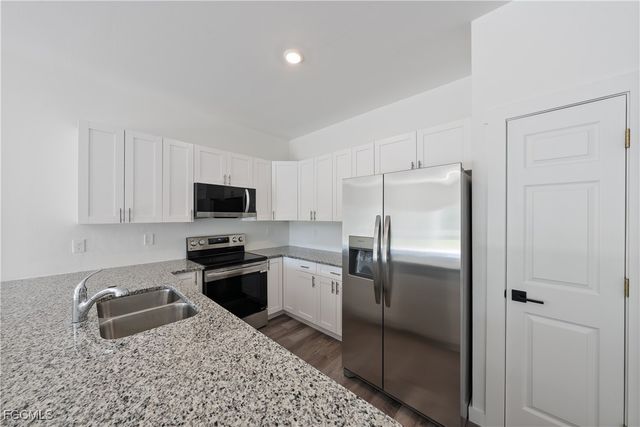 313-315 Ivan AVE S, Lehigh Acres, FL 33973