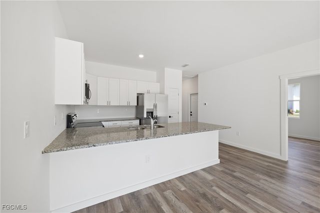 313-315 Ivan AVE S, Lehigh Acres, FL 33973