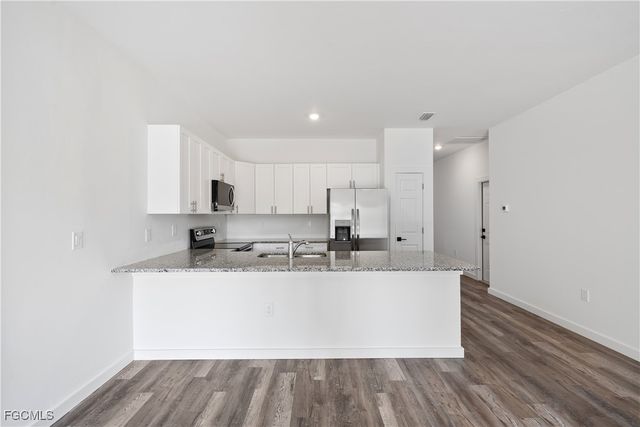 313-315 Ivan AVE S, Lehigh Acres, FL 33973