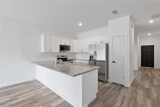 313-315 Ivan AVE S, Lehigh Acres, FL 33973