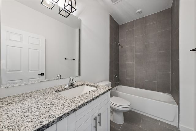 313-315 Ivan AVE S, Lehigh Acres, FL 33973