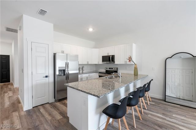 313-315 Ivan AVE S, Lehigh Acres, FL 33973