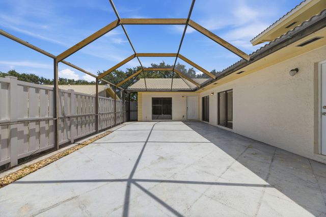 12501 WOODMILL Drive, Palm Beach Gardens, FL 33418