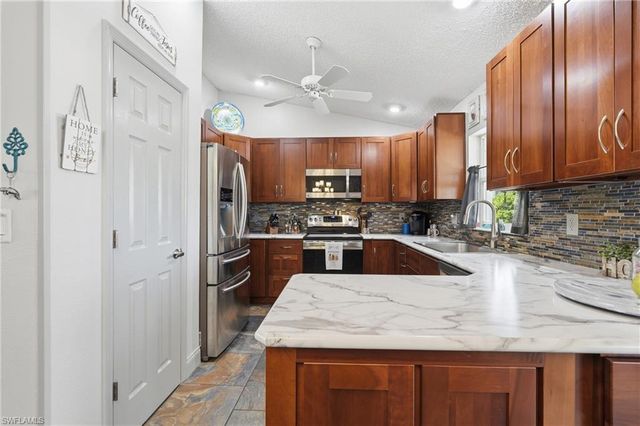 1529 Crestwood CIR W, Lehigh Acres, FL 33936