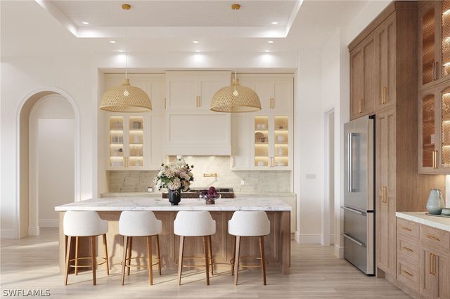 335 Burning Tree DR, Naples, FL 34105