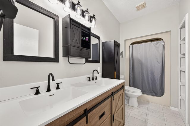 4930 Pleasure Lake Lane, Willis, TX 77318