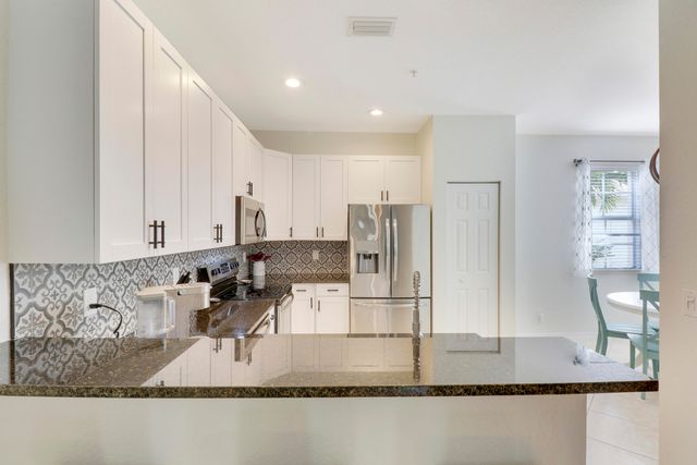 123 E Thatch Palm Circle, Jupiter, FL 33458