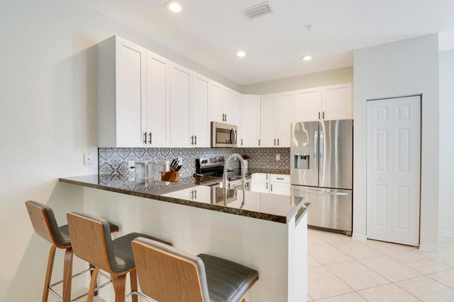 123 E Thatch Palm Circle, Jupiter, FL 33458