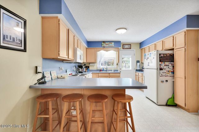 302 SE 79th Street, Oak Island, NC 28465