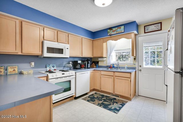 302 SE 79th Street, Oak Island, NC 28465