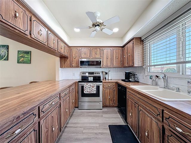 9961 EAGLES POINT CIRCLE 4, Port Richey, FL 34668