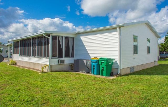 830 Lychee Drive, Barefoot Bay, FL 32976