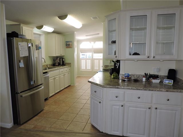 830 Lychee Drive, Barefoot Bay, FL 32976