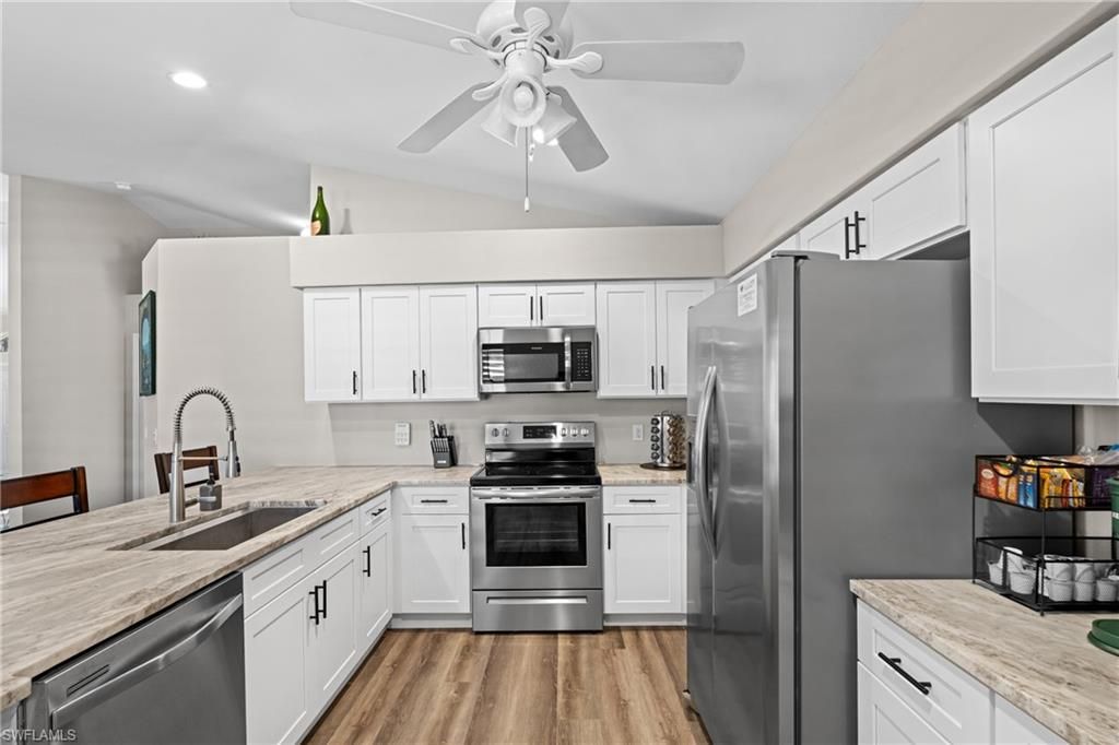 2014 NW 25th PL, CAPE CORAL, FL 33993 — photo 4
