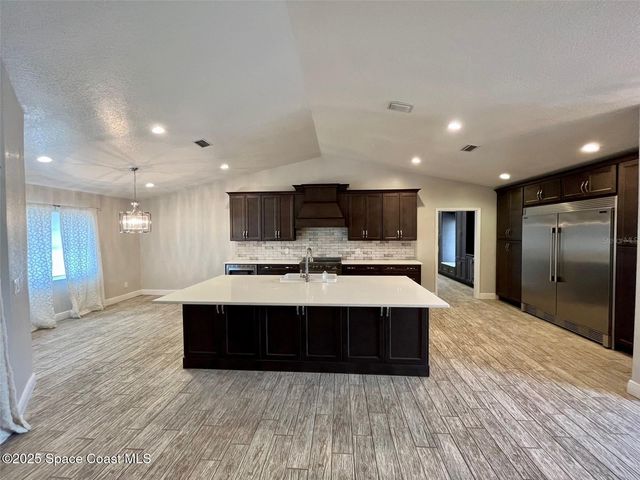 704 Osmosis Drive SW, Palm Bay, FL 32908