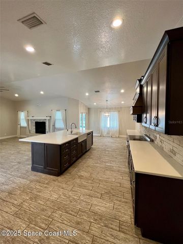 704 Osmosis Drive SW, Palm Bay, FL 32908