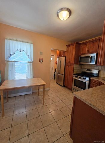 84-11 Sutter Avenue, Ozone Park, NY 11417