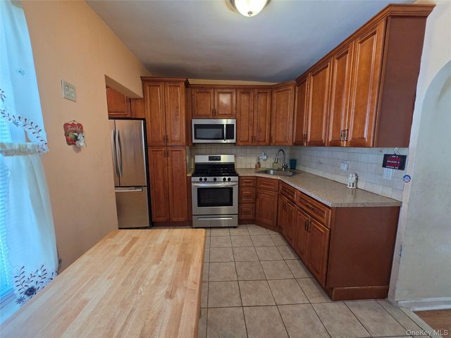 84-11 Sutter Avenue, Ozone Park, NY 11417