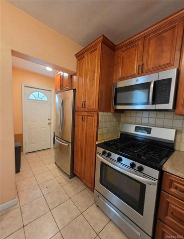 84-11 Sutter Avenue, Ozone Park, NY 11417