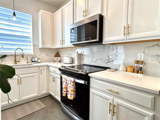 921 SPRING PALMS LOOP, Orlando, FL 32828