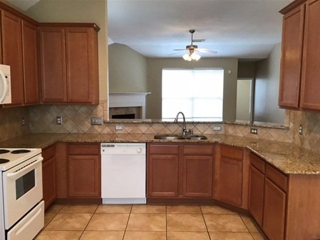 8723 Rollick Drive, Tomball, TX 77375