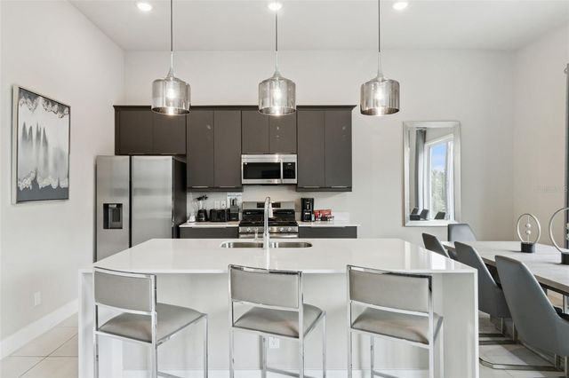 7760 SANDY RIDGE DRIVE 214, Reunion, FL 34747