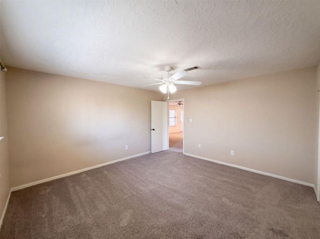 11819 Amblewood Drive, Meadows Place, TX 77477