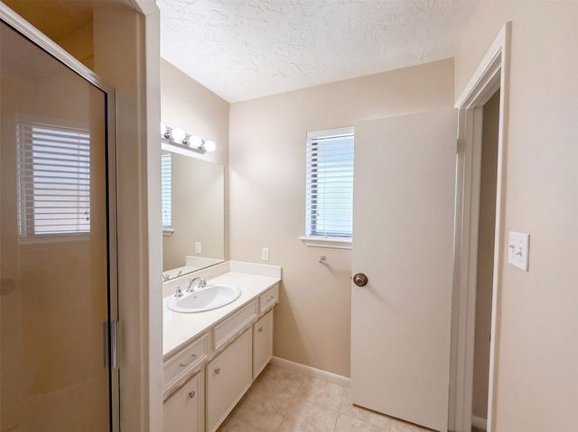 11819 Amblewood Drive, Meadows Place, TX 77477