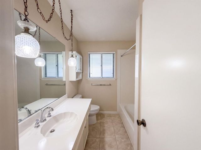 11819 Amblewood Drive, Meadows Place, TX 77477