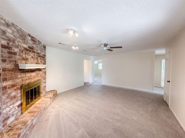 11819 Amblewood Drive, Meadows Place, TX 77477