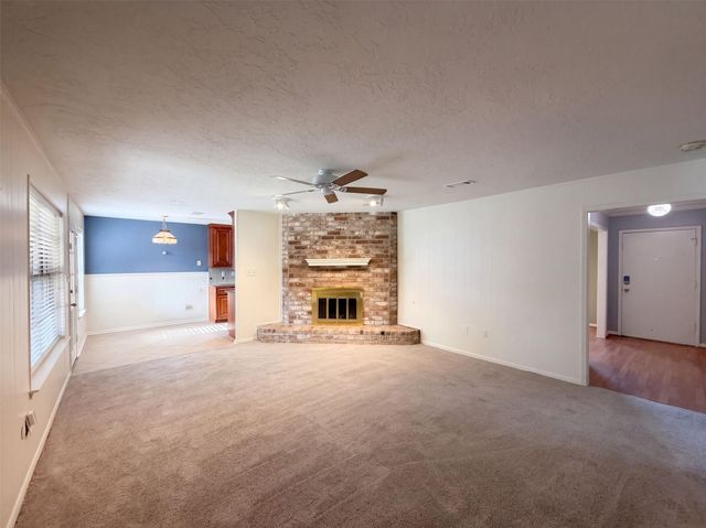 11819 Amblewood Drive, Meadows Place, TX 77477
