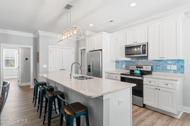 319 NE 61st Street, Oak Island, NC 28465