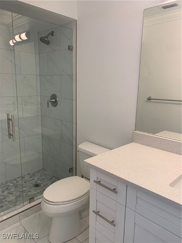 310 Carnaby CT, Naples, FL 34112