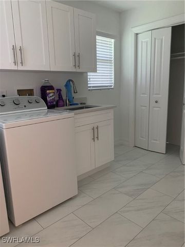 310 Carnaby CT, Naples, FL 34112