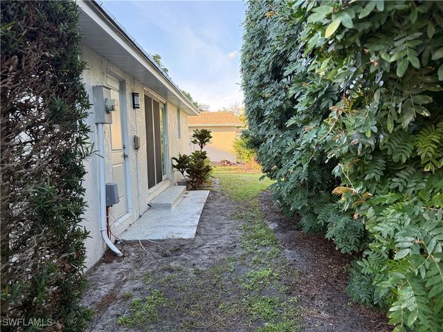 310 Carnaby CT, Naples, FL 34112