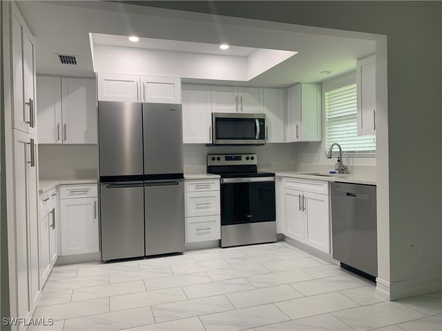 310 Carnaby CT, Naples, FL 34112