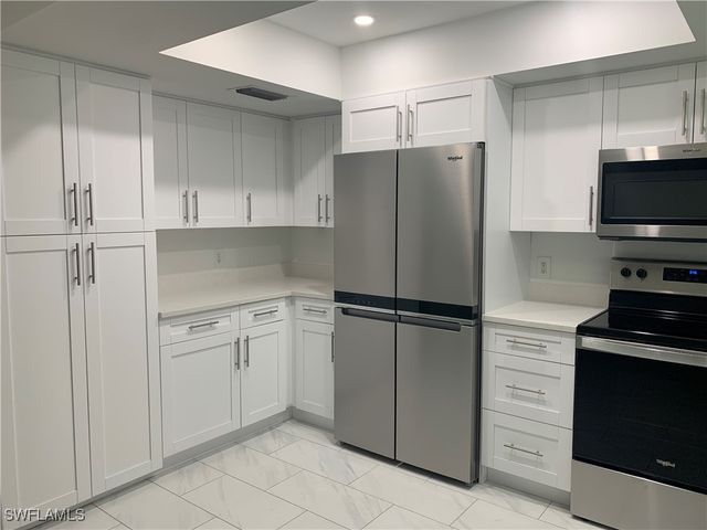 310 Carnaby CT, Naples, FL 34112